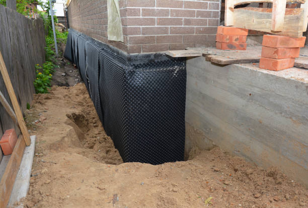 SJ Waterproofing Pros technician performing targeted Sump Pump Installation assessment in Grandview, OH